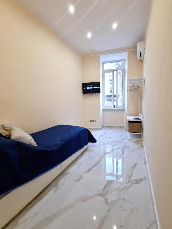 Posteľ alebo postele v izbe v ubytovaní Re Ferdinando Apartment