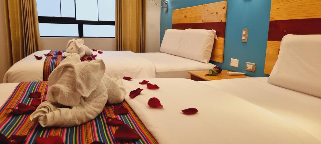 Letto o letti in una camera di HOTEL LUZ GARDEN