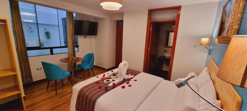 Letto o letti in una camera di HOTEL LUZ GARDEN