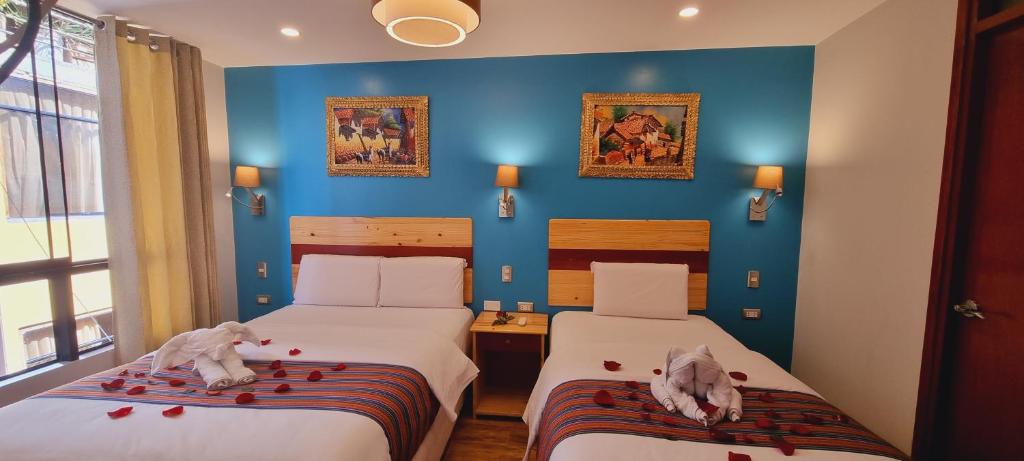 Letto o letti in una camera di HOTEL LUZ GARDEN