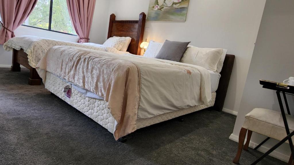 Letto o letti in una camera di Gowrie Agapanthus
