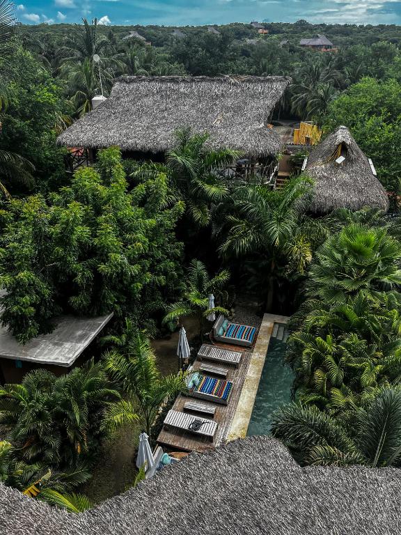 an aerial view of a resort with a swimming pool at Hotel Gallo de Mar in Puerto Escondido