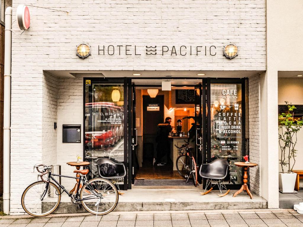 a bike parked outside of a hotel and pacific at Hotel Pacific Kanazawa in Kanazawa