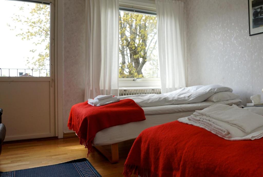 Postel nebo postele na pokoji v ubytování Dinners Mellerud