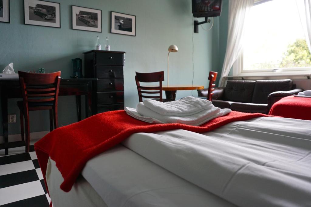 Postel nebo postele na pokoji v ubytování Dinners Mellerud