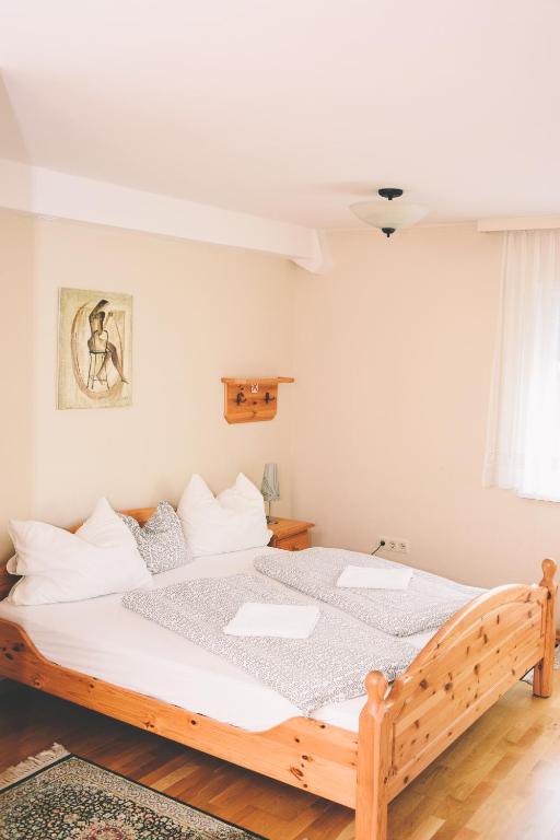 Postel nebo postele na pokoji v ubytování Pension s'Platzl Stuhleck