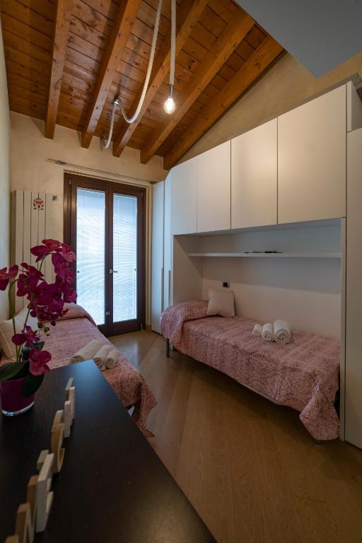 Postel nebo postele na pokoji v ubytování DIAMOND SUITE