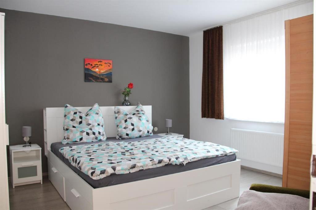 Postel nebo postele na pokoji v ubytování Ferienwohnung Grete