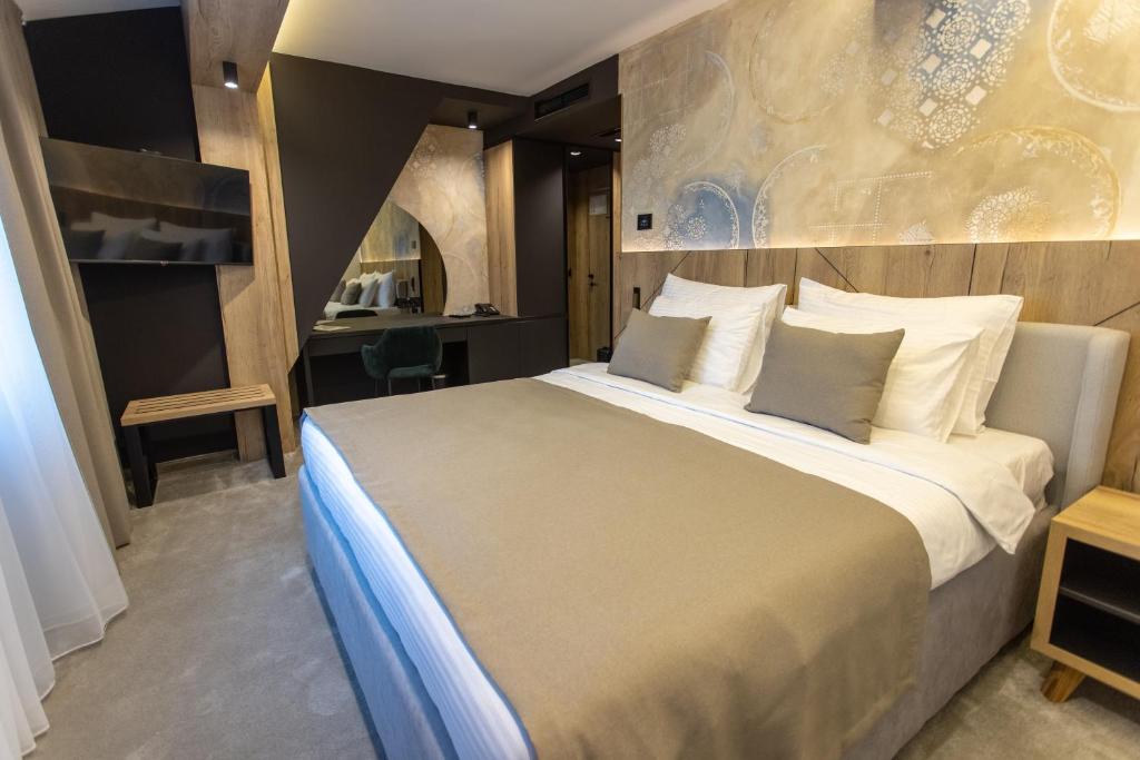 Krevet ili kreveti u jedinici u okviru objekta HOTEL ROYAL MOUNTAIN
