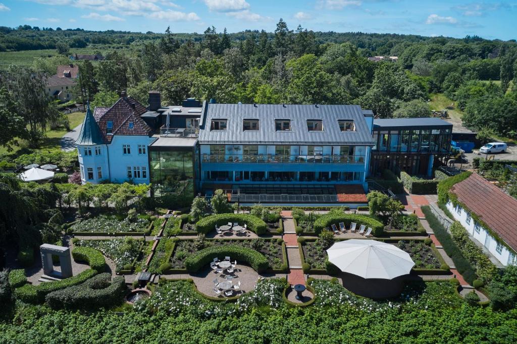 an aerial view of a house with a garden at Kiviks Hotell in Kivik
