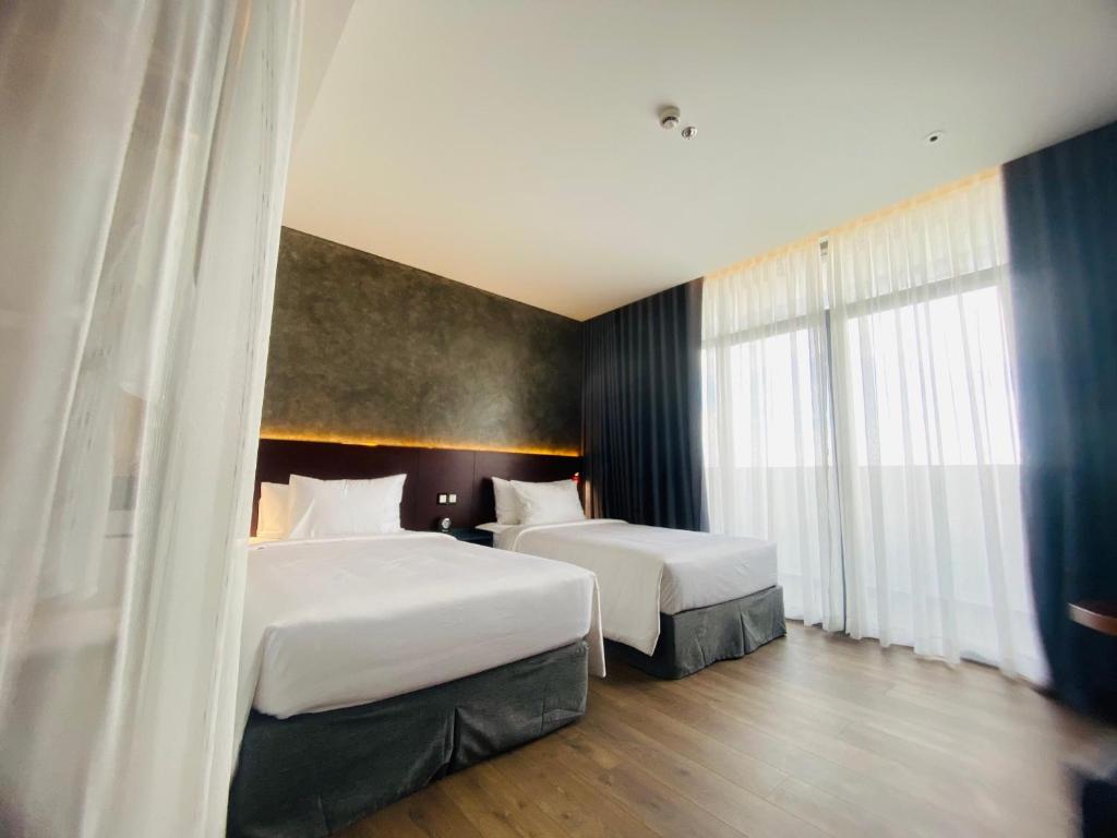 NEWCC HOTEL AND SERVICED APARTMENT - Camera Superior Con Letti Singoli Con Vista Città