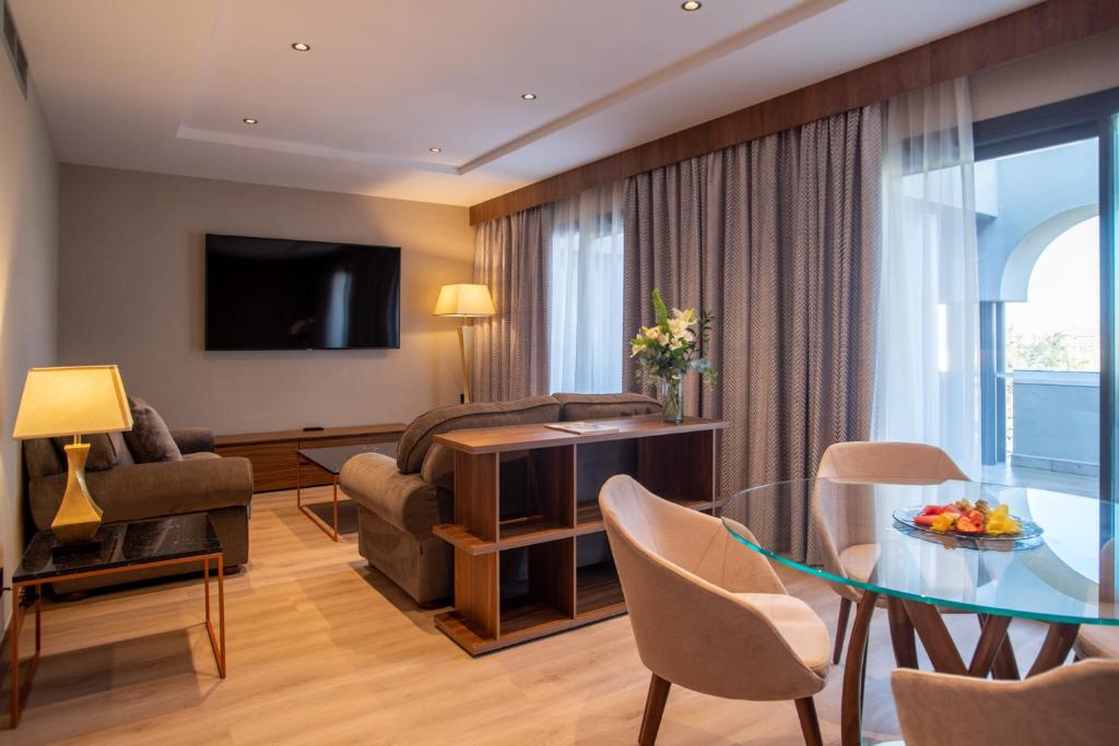 TV a/nebo společenská místnost v ubytování Hotel Granada Center