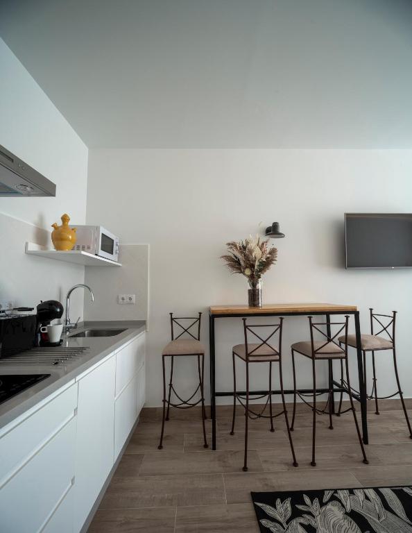 Kuchyňa alebo kuchynka v ubytovaní Apartamentos Rosa Velázquez