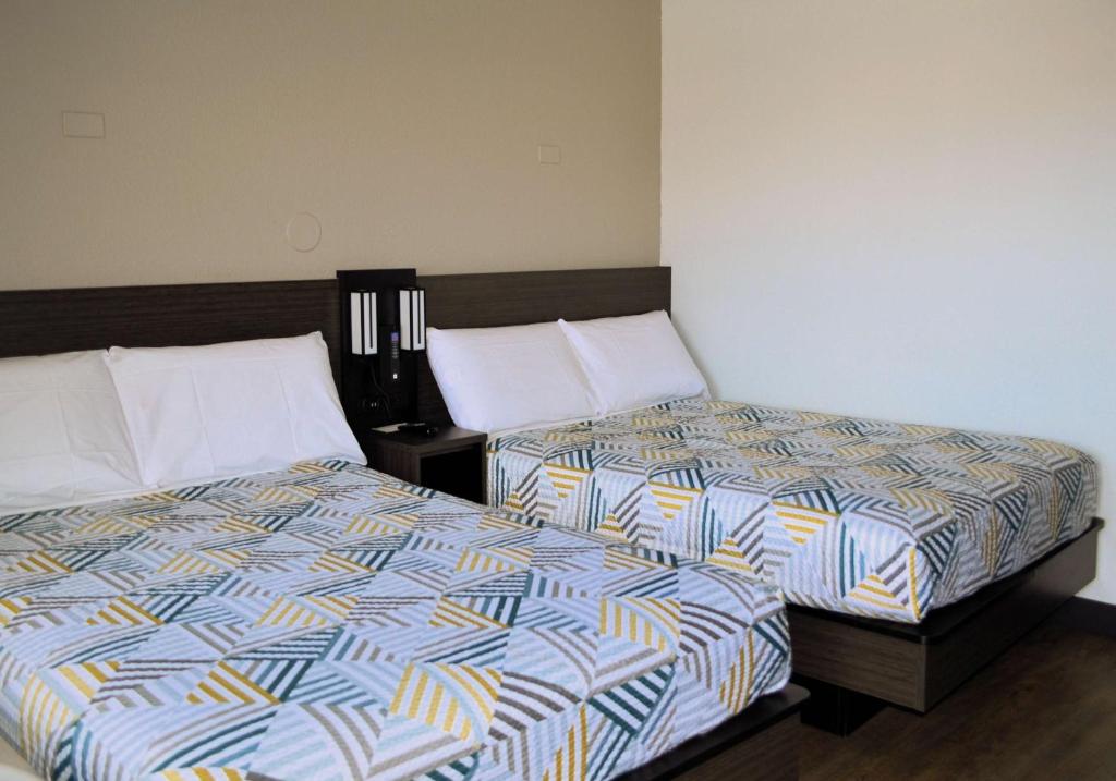 Postel nebo postele na pokoji v ubytování Motel 6-Reno, NV - Livestock Events Center