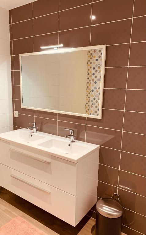 Koupelna v ubytování Gîte « Au petit Bonheur »