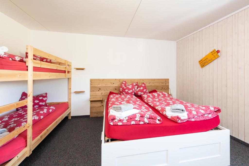 Postel nebo postele na pokoji v ubytování Heuberge
