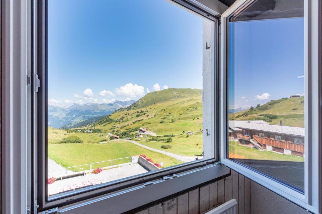 Nespecifikovaný výhled na hory nebo výhled na hory při pohledu z hotelu