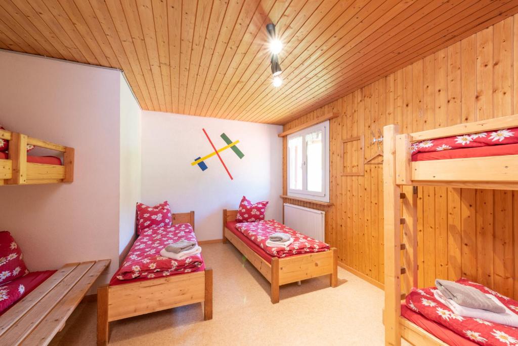 Postel nebo postele na pokoji v ubytování Heuberge