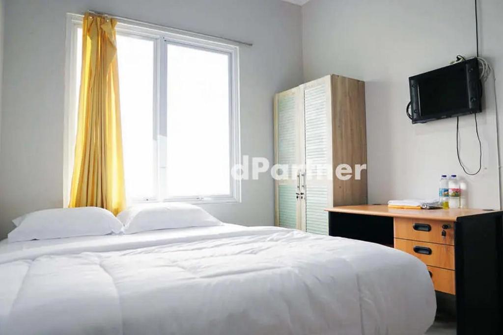 Karawaci Victory Homestay Mitra RedDoorz - 经济双人间