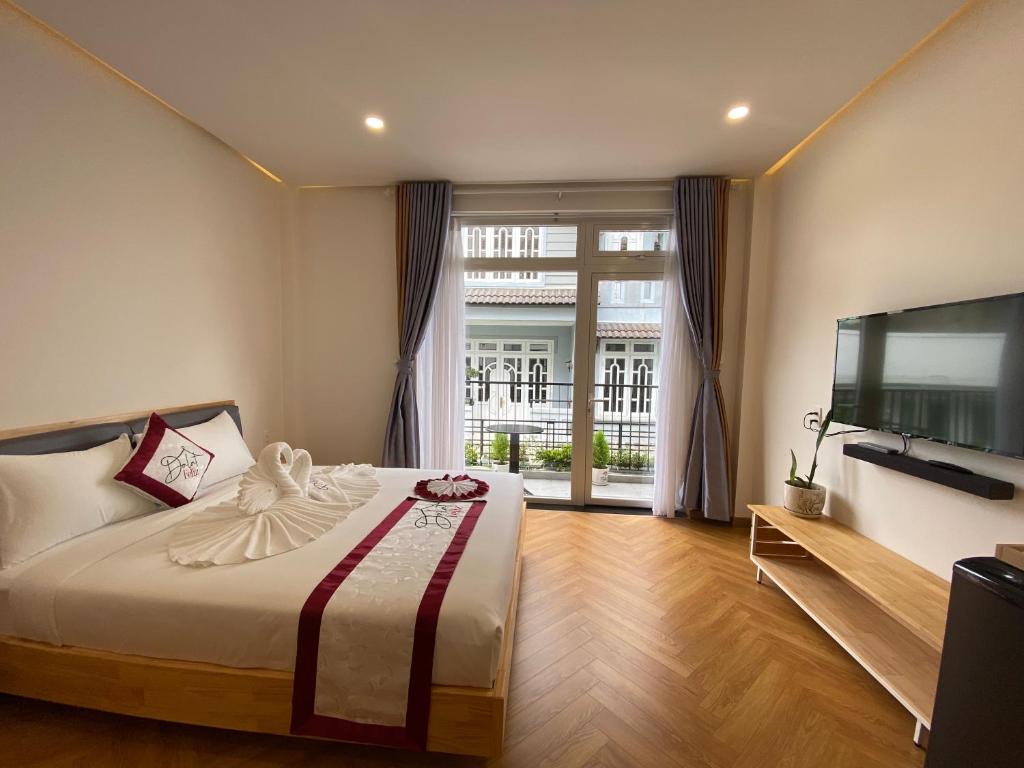 TV/trung tâm giải trí tại Feliz Dalat Homestay