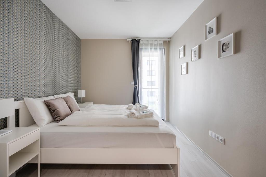 Posteľ alebo postele v izbe v ubytovaní Navy Angel Apartment with balcony