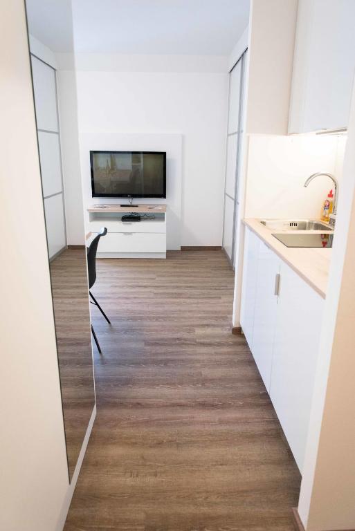 TV a/nebo společenská místnost v ubytování Schönbrunn Design