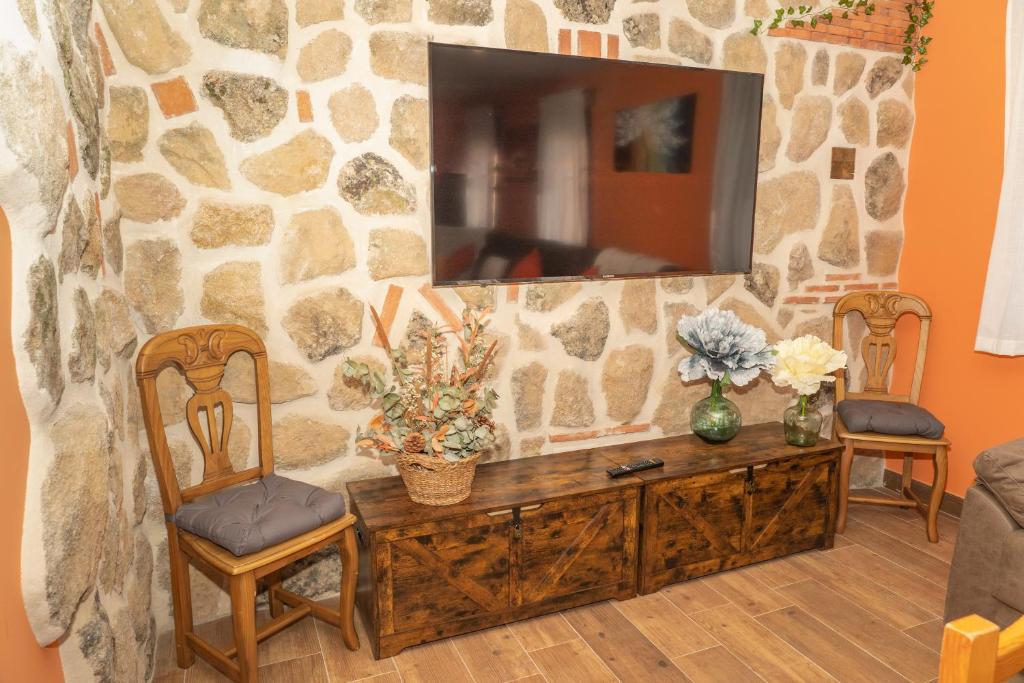 Televízia a/alebo spoločenská miestnosť v ubytovaní La Casona de Trescasas