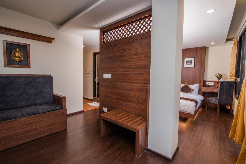 Letto o letti in una camera di Tree of Life Indra Mandala Hotel, Gangtok