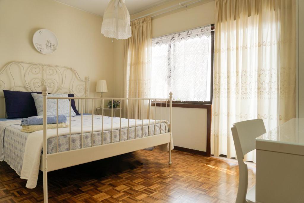 Postel nebo postele na pokoji v ubytování Jardim da Celeste