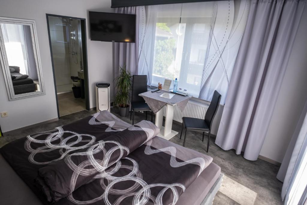 Postel nebo postele na pokoji v ubytování 180Gradblick