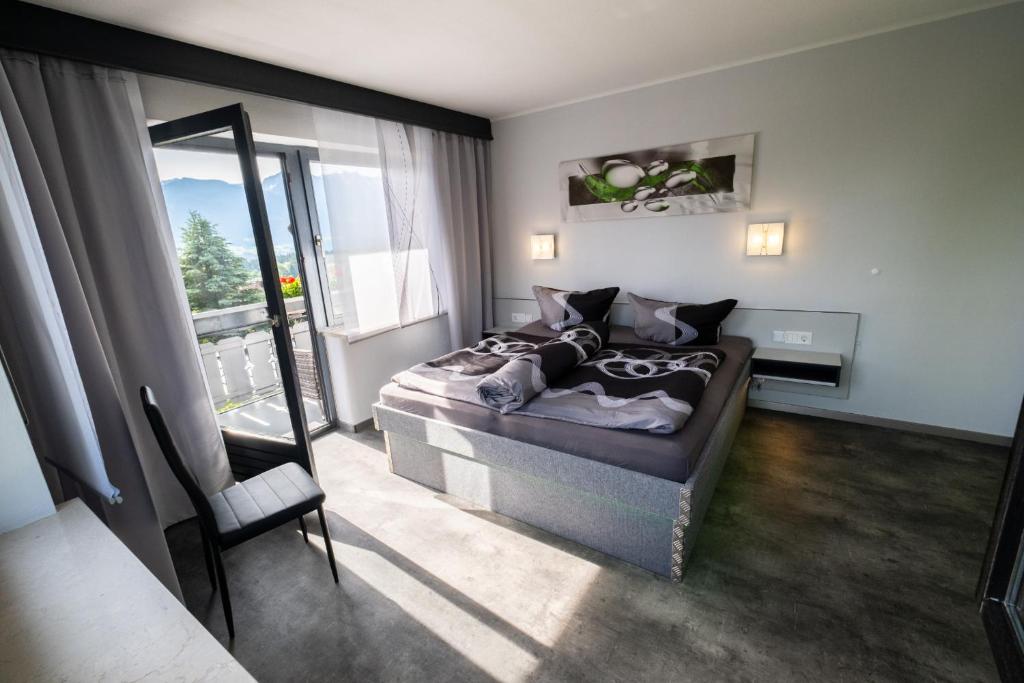 Postel nebo postele na pokoji v ubytování 180Gradblick