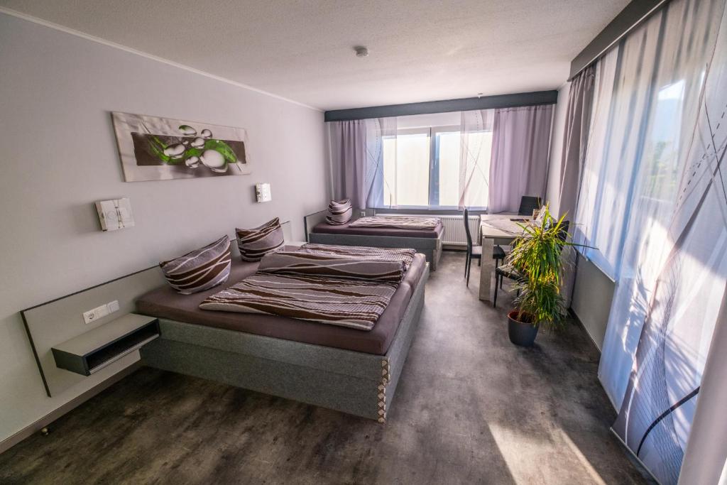 Postel nebo postele na pokoji v ubytování 180Gradblick