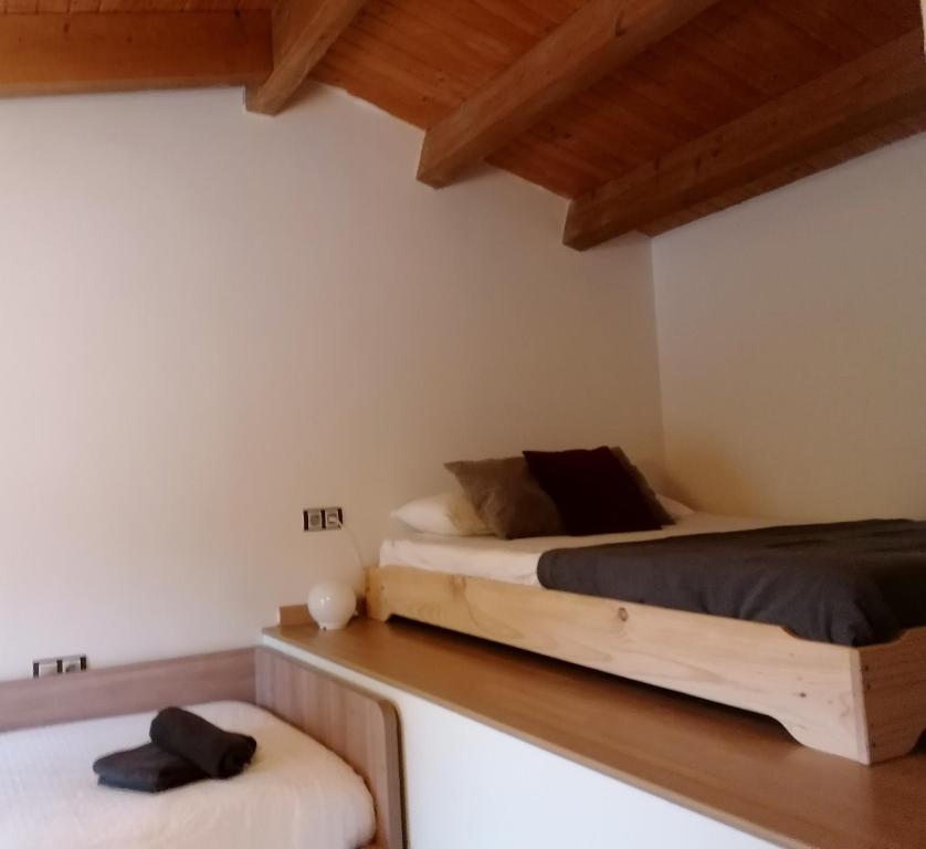 Posteľ alebo postele v izbe v ubytovaní Cal Lledoner