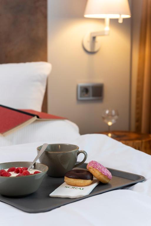 Postel nebo postele na pokoji v ubytování SORAT Hotel Berlin