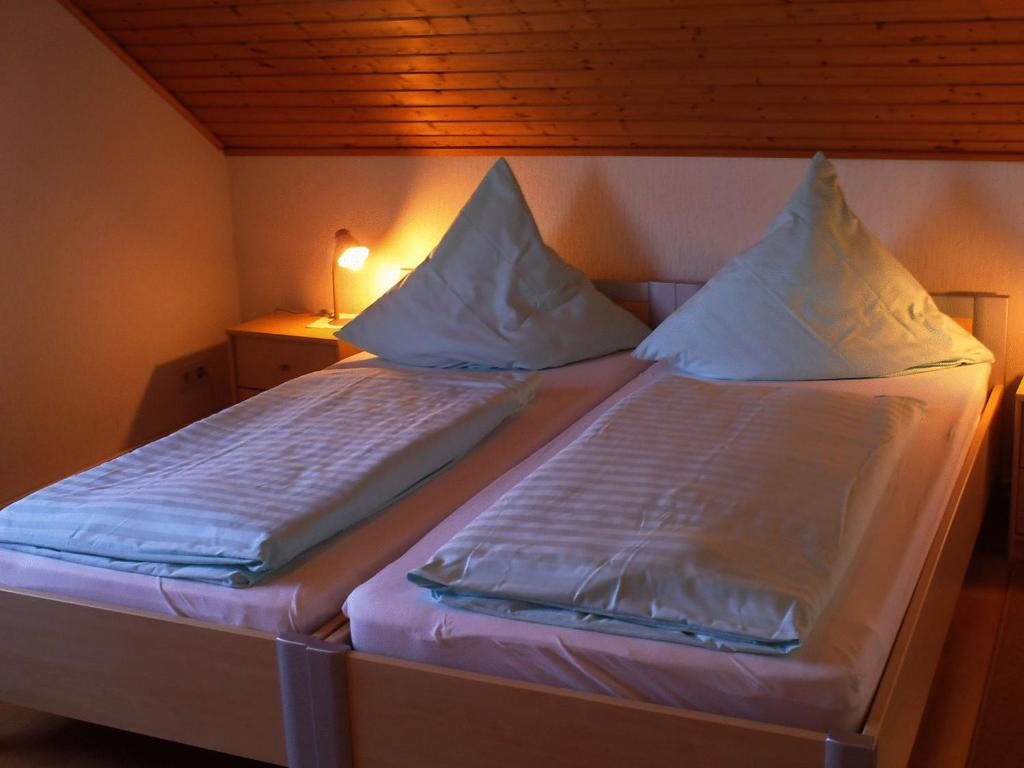 Postel nebo postele na pokoji v ubytování Hotel Jägersruh