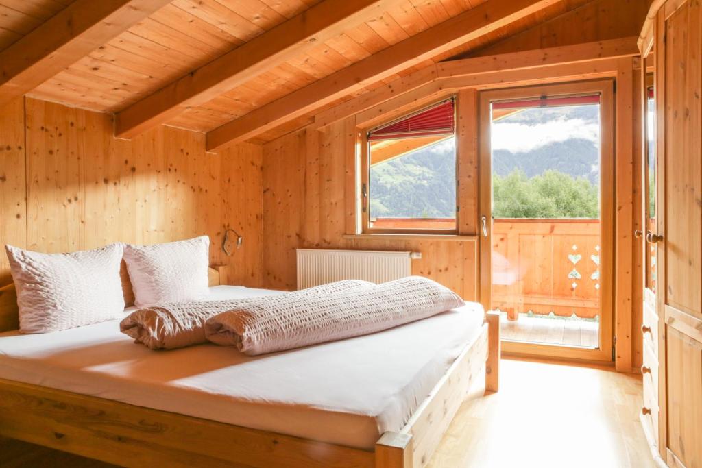Posteľ alebo postele v izbe v ubytovaní Ferienhaus Oetztal