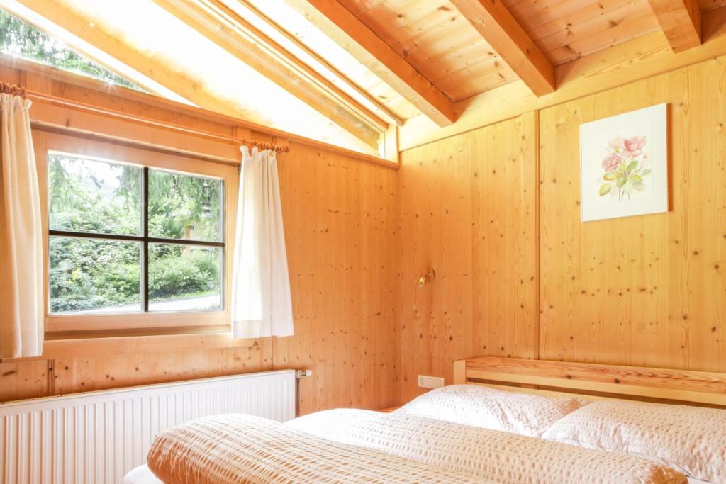 Postel nebo postele na pokoji v ubytování Chalet Astrid