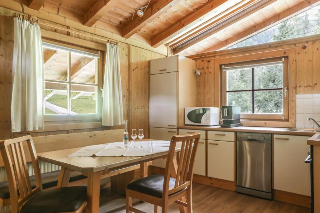 Kuchyň nebo kuchyňský kout v ubytování Chalet Astrid