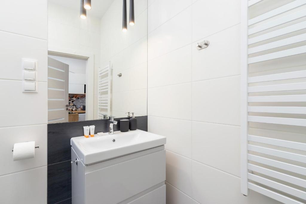 Kúpeľňa v ubytovaní Kraków Trendy Studio Apartments by Noclegi Renters