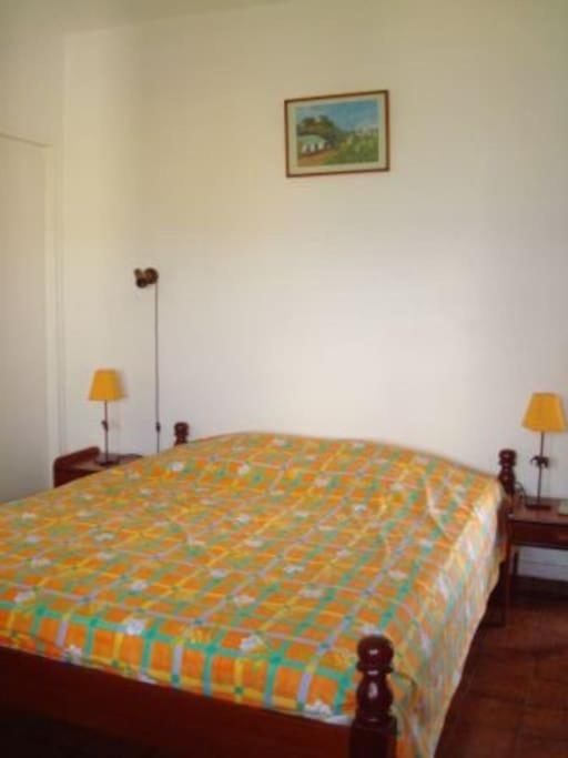 Postel nebo postele na pokoji v ubytování Villa Belle Frégate