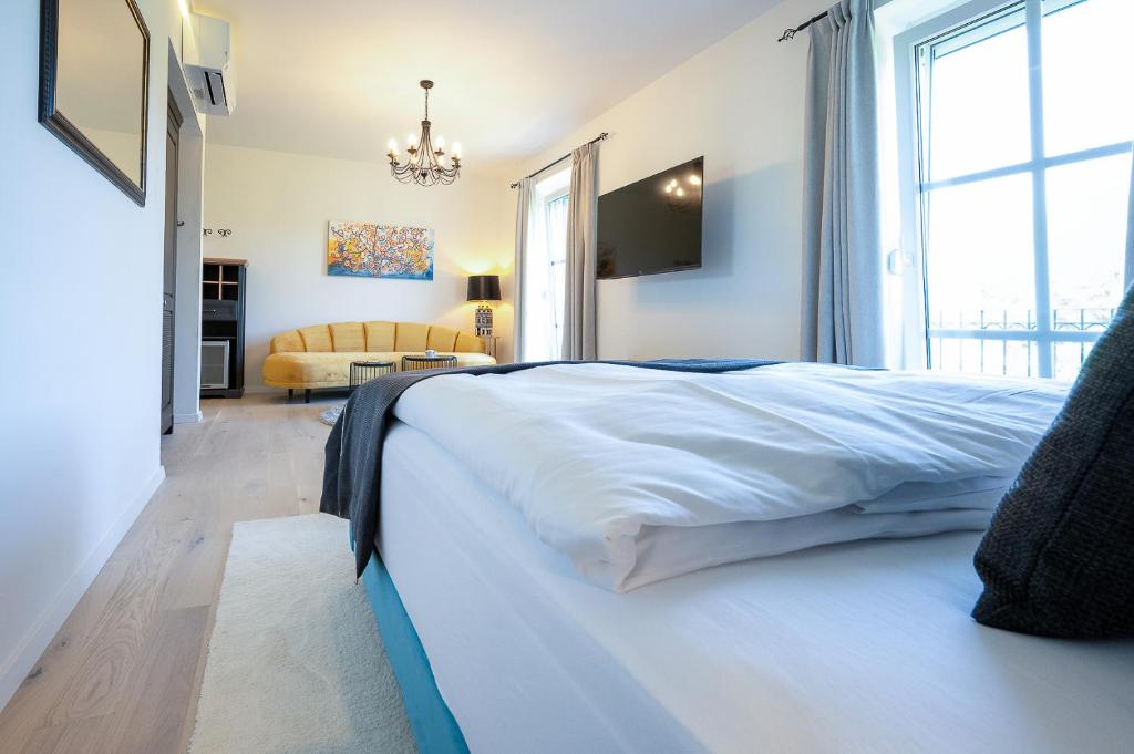 Ένα ή περισσότερα κρεβάτια σε δωμάτιο στο Residenz Styrian Toskana Splendid