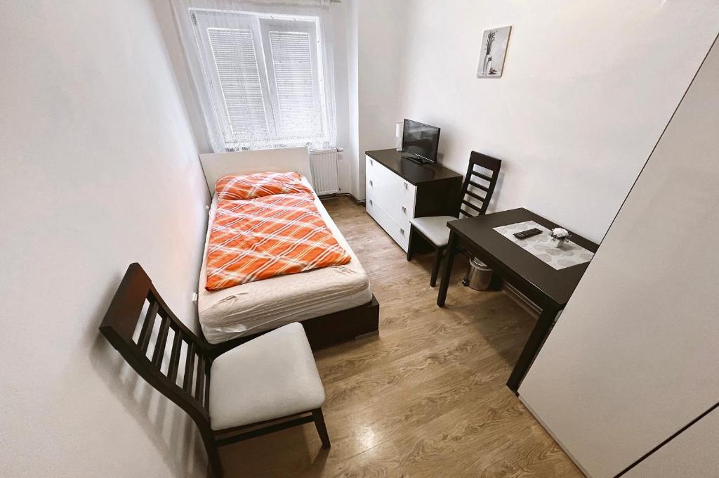 Postel nebo postele na pokoji v ubytování Penzion Zahrádka