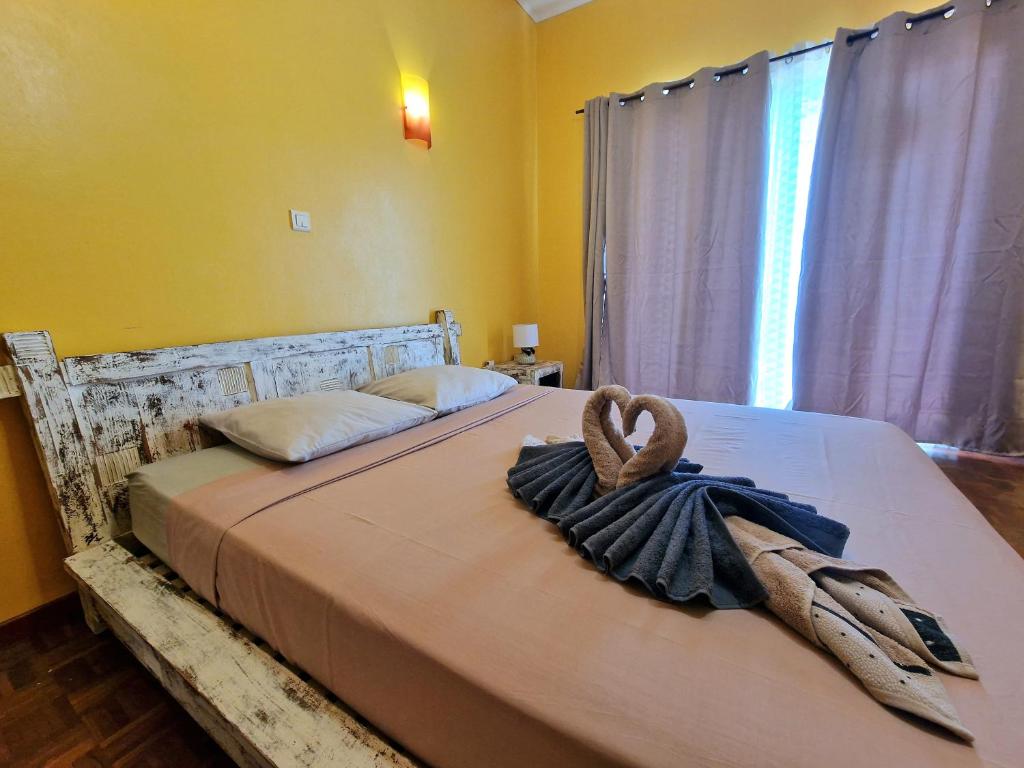 Postel nebo postele na pokoji v ubytování Villa ARC-EN-CIEL