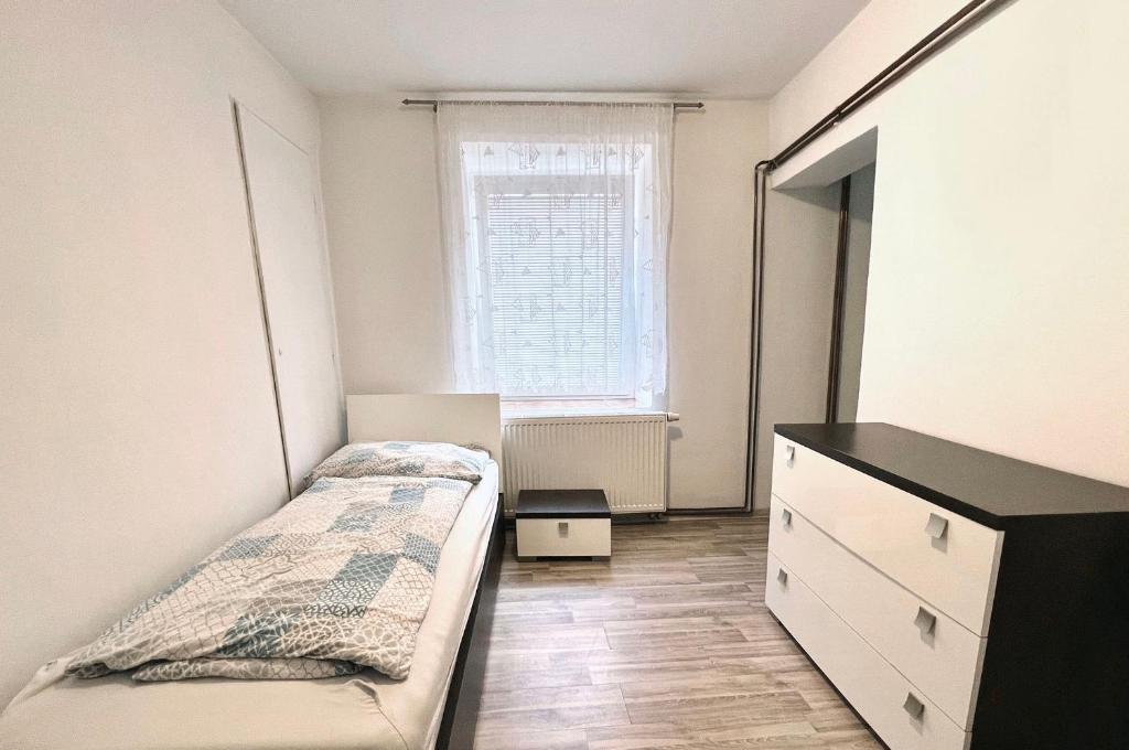 Postel nebo postele na pokoji v ubytování Penzion Zahrádka