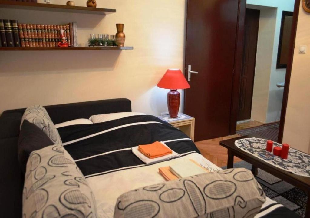 เตียงในห้องที่ Apartment Heart of Podgorica