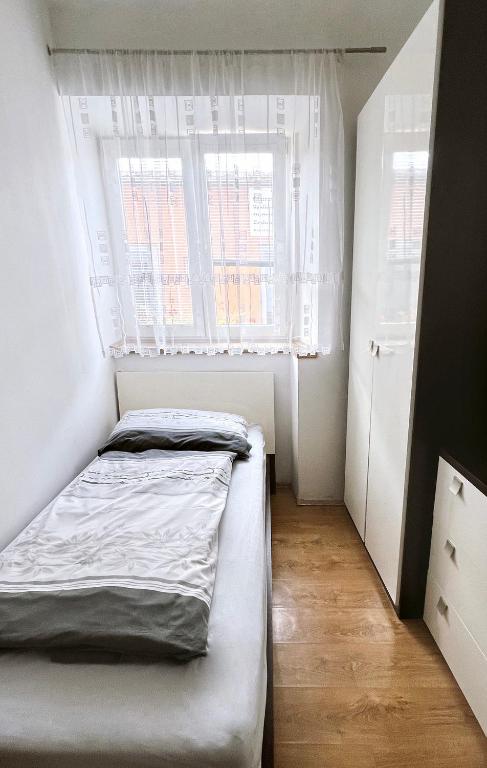 Postel nebo postele na pokoji v ubytování Penzion Zahrádka