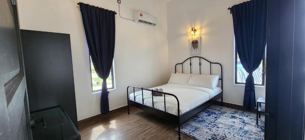 Postel nebo postele na pokoji v ubytování Kamalia Villas