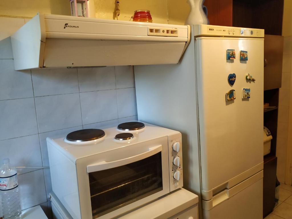 Kuchyň nebo kuchyňský kout v ubytování Central Kiato