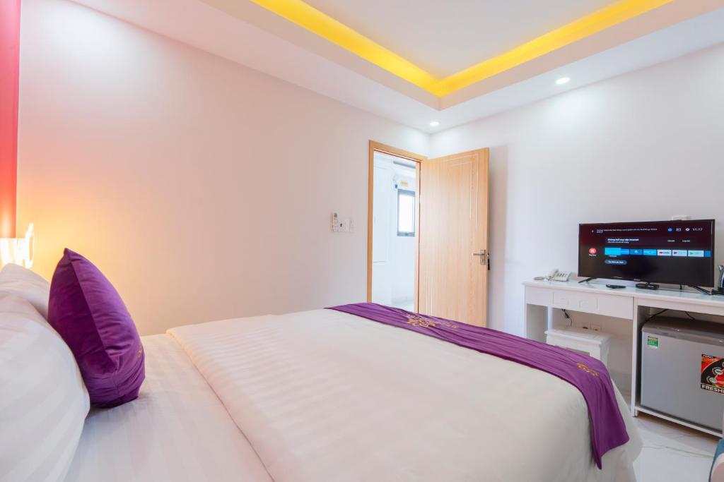 Giường trong phòng chung tại Sen Hotel Phu Quoc