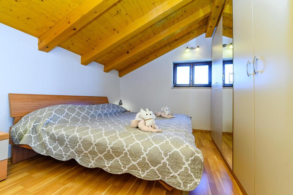 Postel nebo postele na pokoji v ubytování Apartman Marina